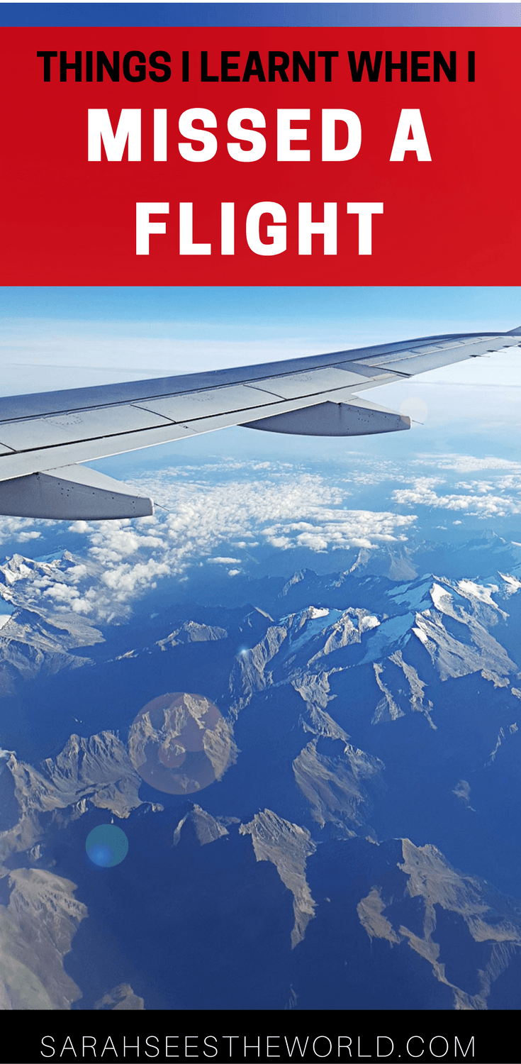 plane wing over mountains