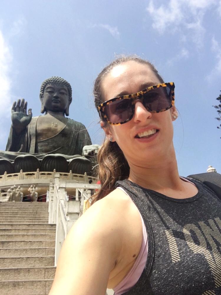 selfie of female with big buddha lantau island hong kong