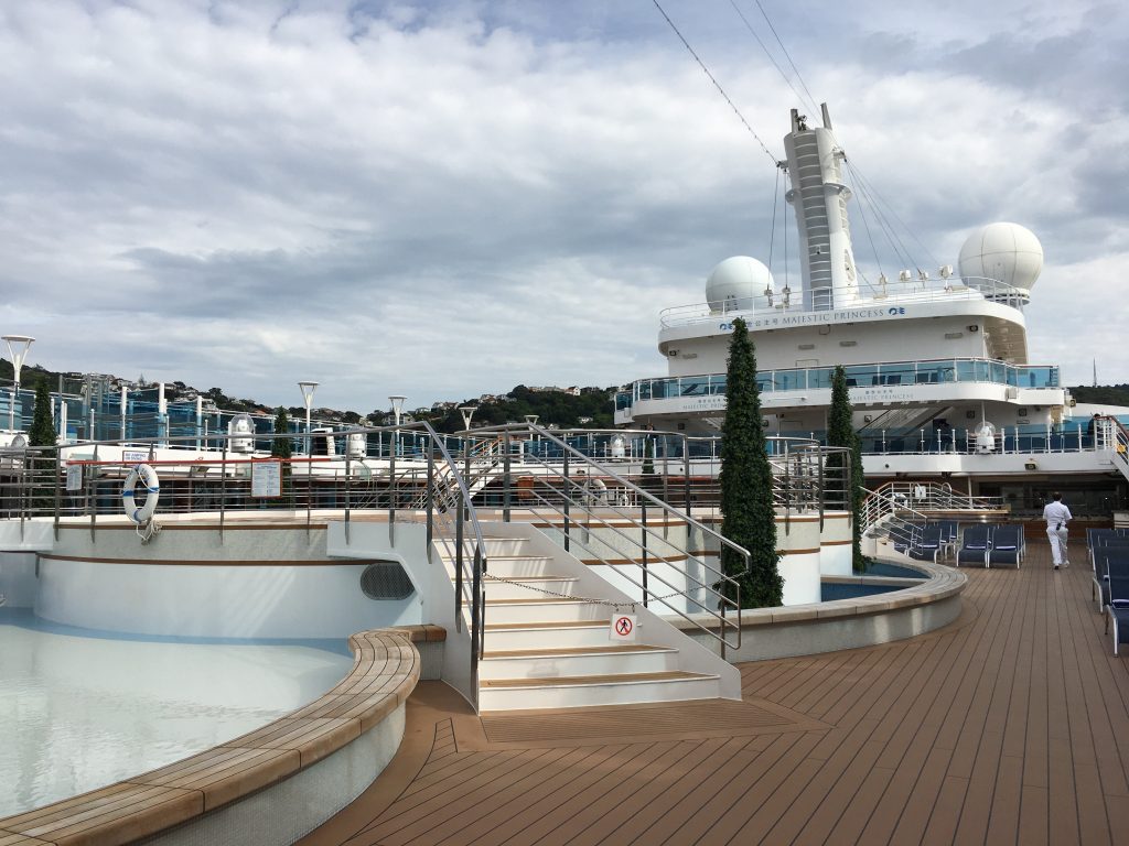 Pool Deck Majestic Princess Cruise Ship with cloudy sky