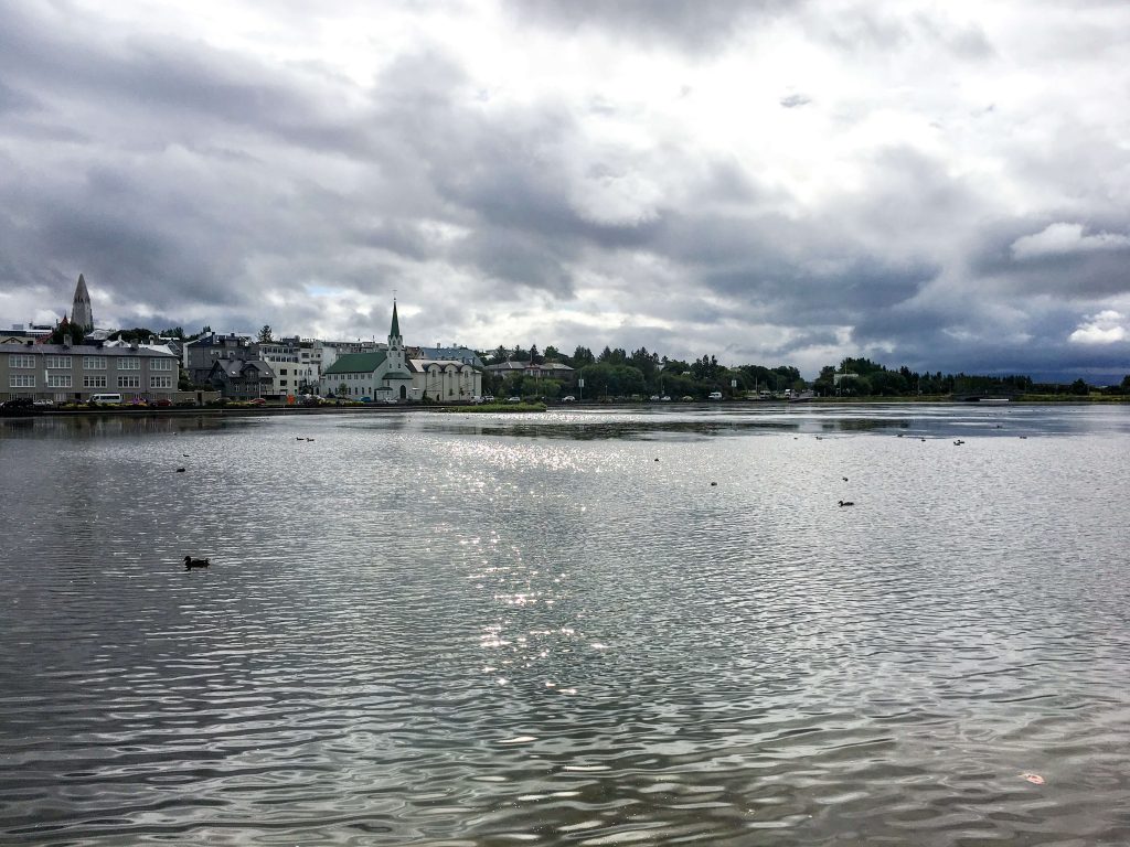 Looking across Lake Tjörnin in Reykjavik on cloudy day