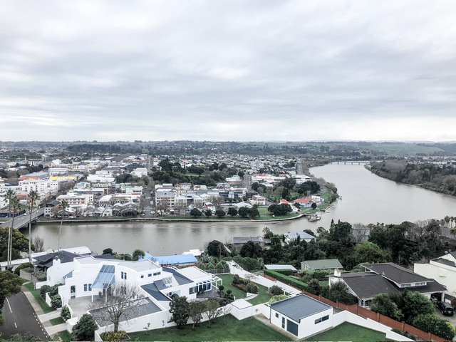 View of Whanganui from top of the Durie Hill Elevator. The Whanganui River runs through the centre of the picture with houses and buildings either side.