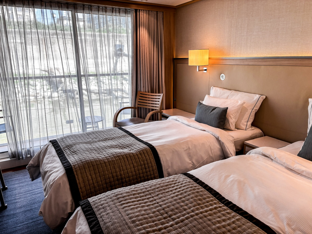 Veranda stateroom set up in a twin bed formation on a Viking river cruise ship.