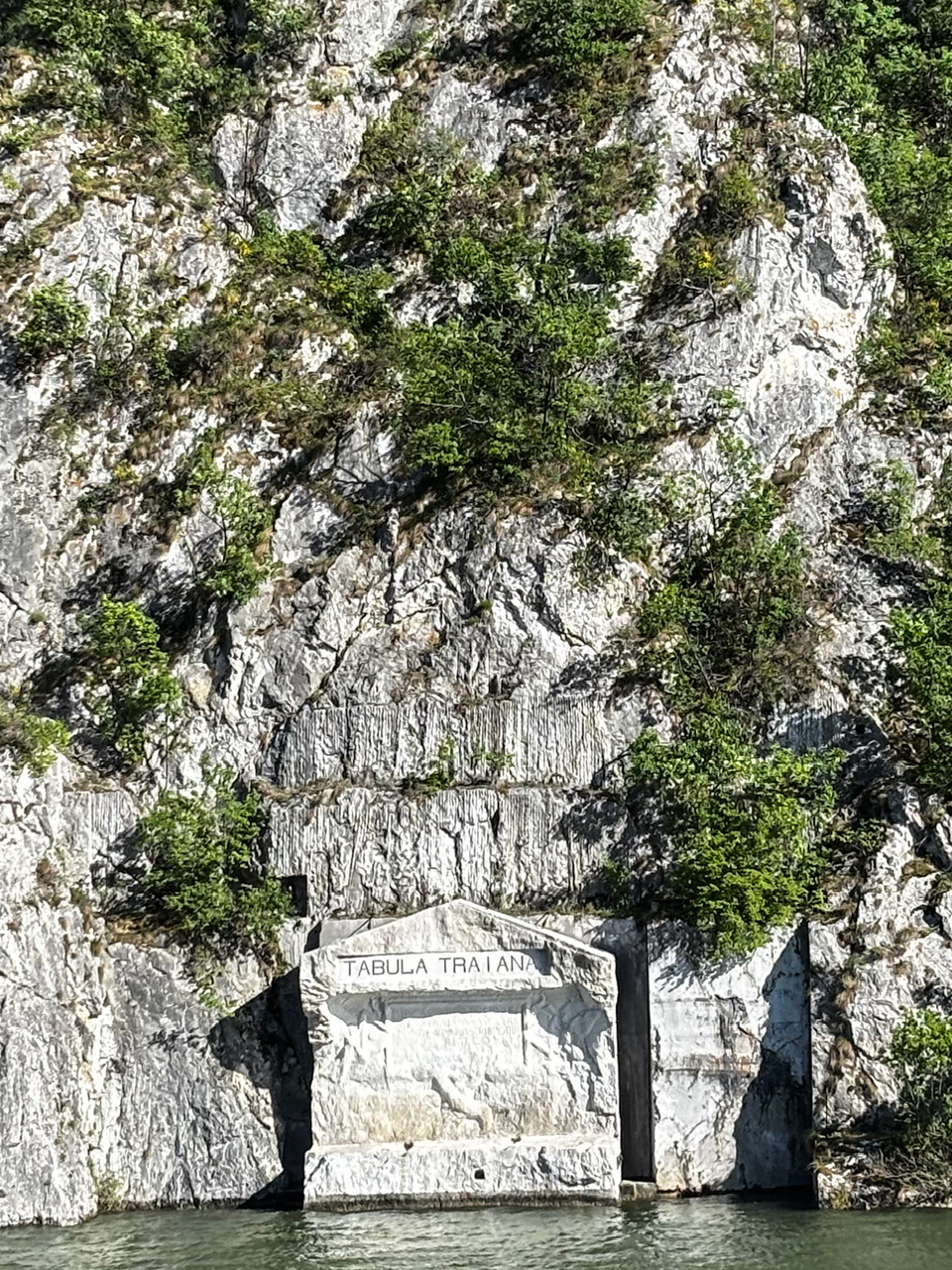Tabula Traiana (Trajan's Plaque) a Romanian memorial plaque dedicated to Emperor Trajan seen from a river ship on the Danube River.